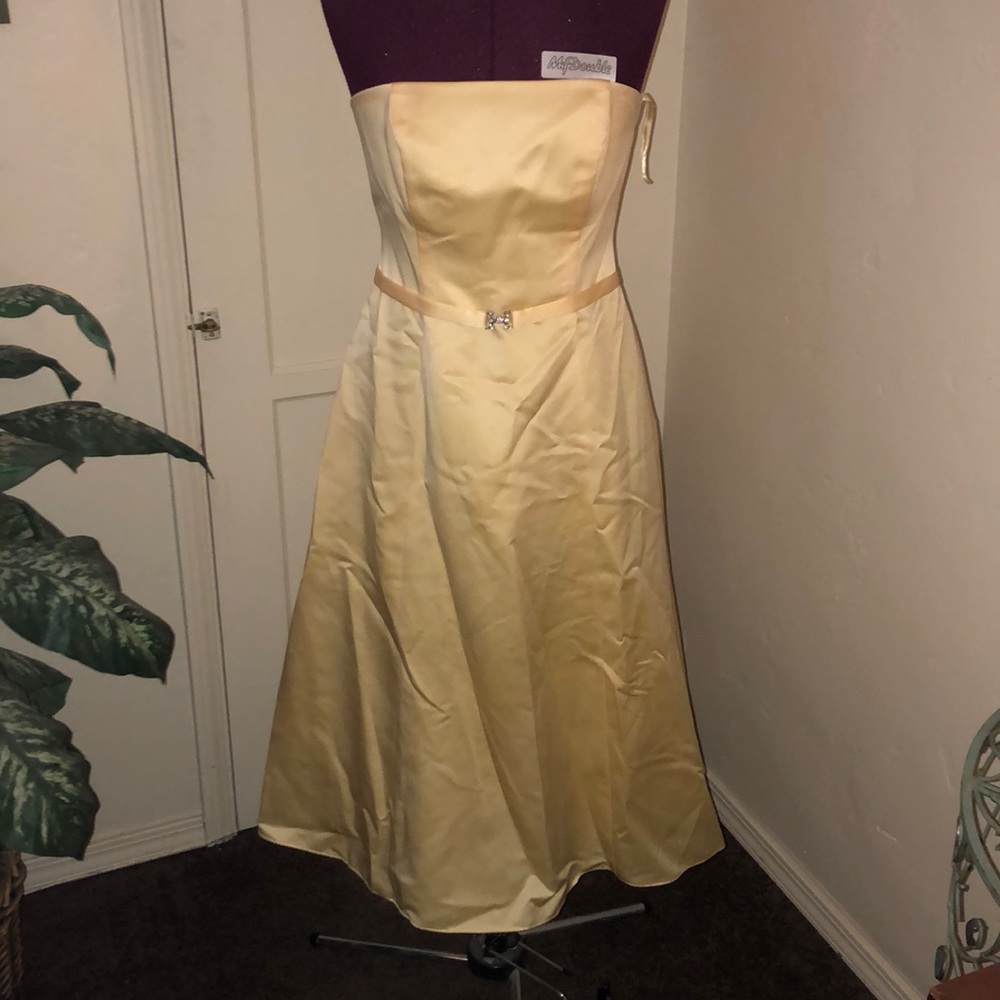Yellow strapless bridesmaid dress with shawl